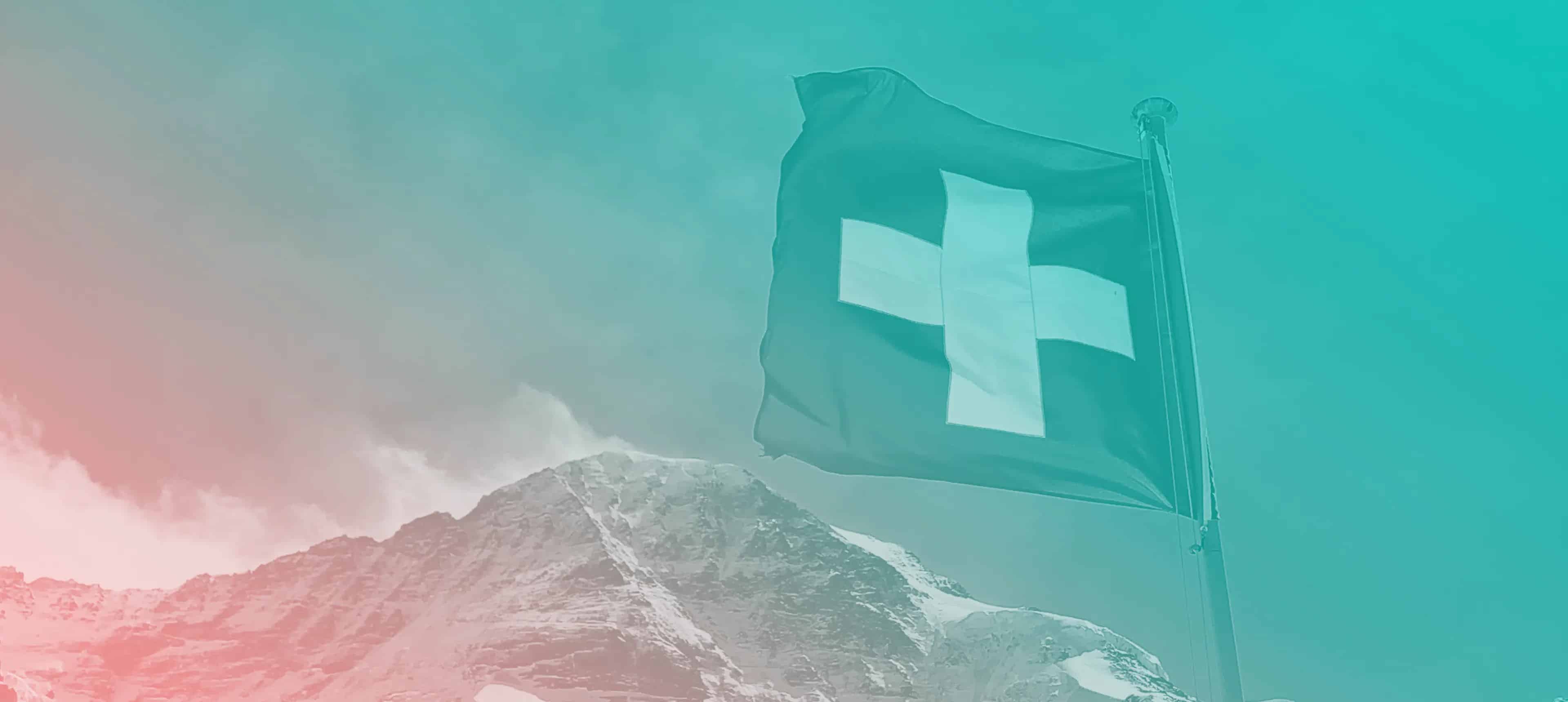 Test de naturalisation Suisse – Drapeau suisse devant une montagne